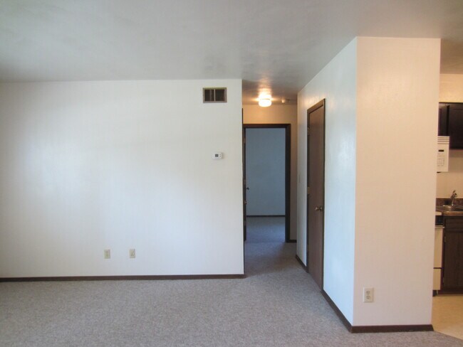 Living Room/Hall Way - Colonial Square Apartments