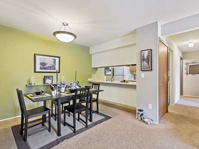 Spacious Dining Area with breakfast bar at Woodland Villa Apartments in Westland, MI - Woodland Villa Apartments