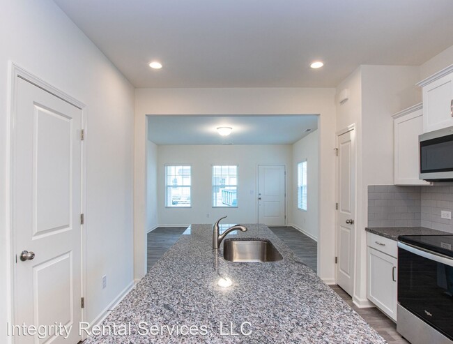 Building Photo - 2 br, 2.5 bath House - 3906 Wagon Way