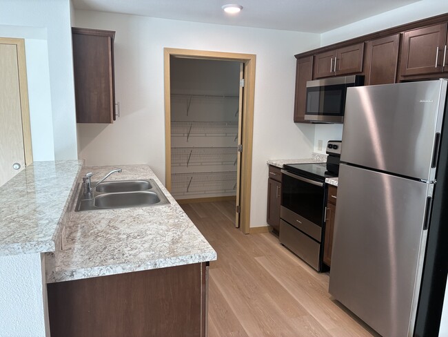 One Bedroom with pantry - Stone Meadow Apartments