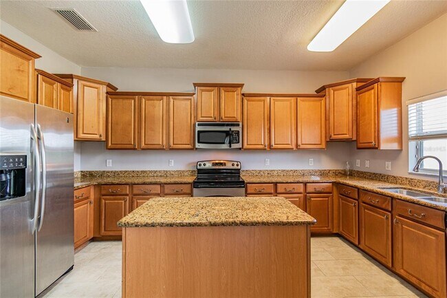 Foto del edificio - 8016 Alamosa Wood Ave
