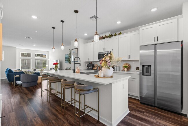 Foto del edificio - Upgraded 3BR/3.5BA Laureate Park Townhome | 2-Car Garage + EV Charging