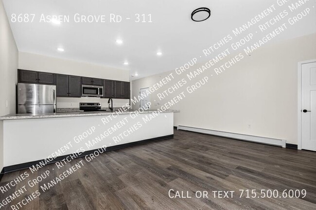 Building Photo - 8687 Aspen Ln