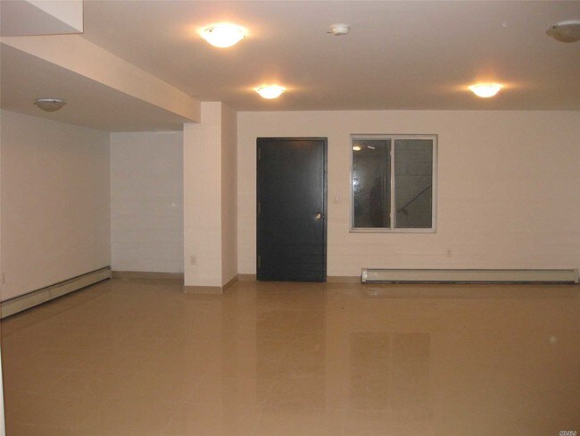 Building Photo - 104-64 39th Ave