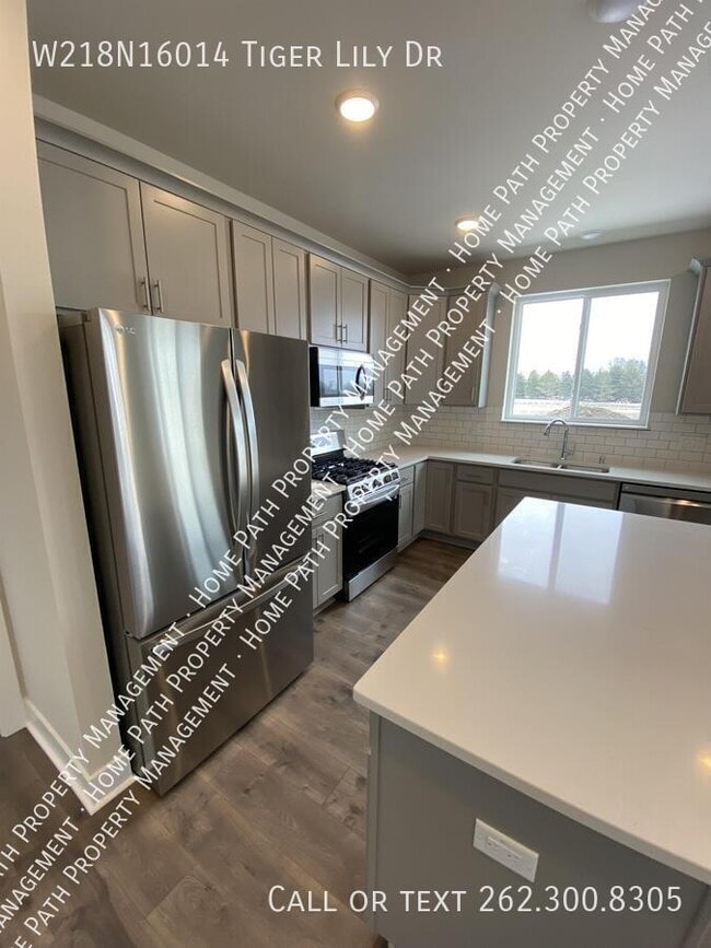 Building Photo - W218N16014 Tiger Lily Dr