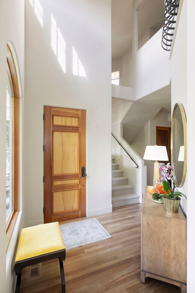 Step into this lovely entryway with soaring ceilings and an inviting main level - 745 Rice St E