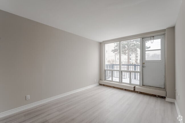 3BR, 1BA - Living Room - Cedar-Wentworth Apartments