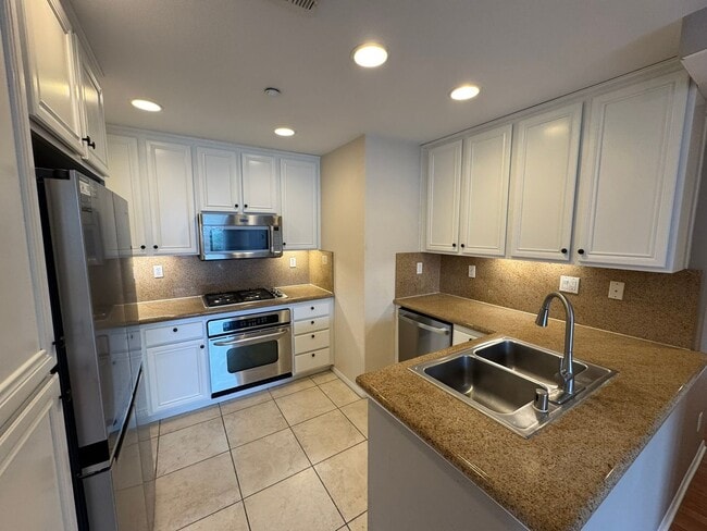 Building Photo - Sleek 3-Bed + Flex Corner Condo with Attached Tandem Garage