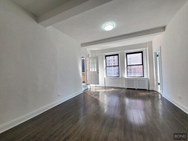 Foto del edificio - 145 W 55th St