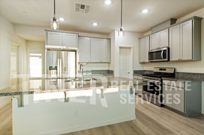 Foto del edificio - 3698 E Commerce Way