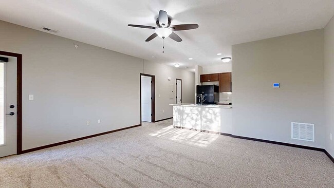 The spacious living room of our 1-bed Fir Villa. - The Villas at Wilderness Ridge