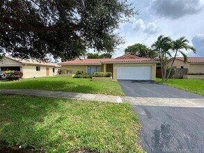 Building Photo - 9658 NW 28th Ct