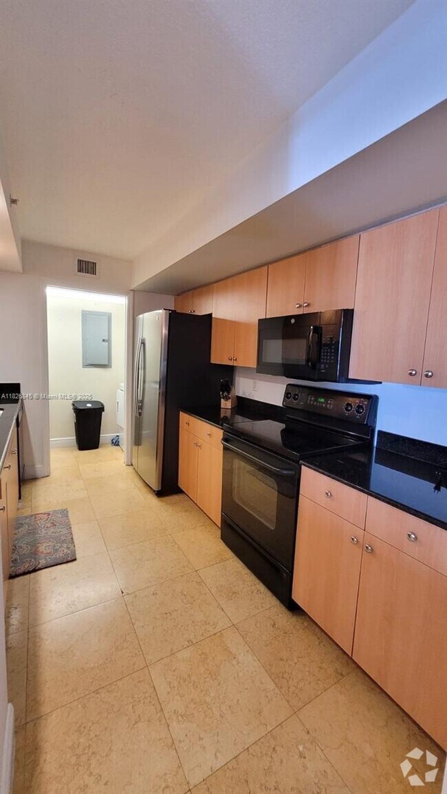 Building Photo - 6917 Collins Ave