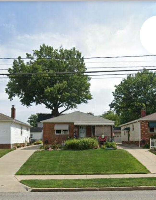 Front of home with porch and overhang - 6363 State Rd