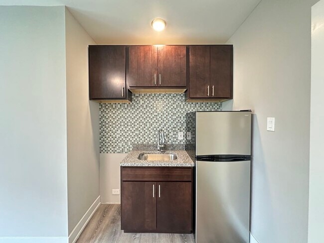 Foto del edificio - 4551 N Damen Ave