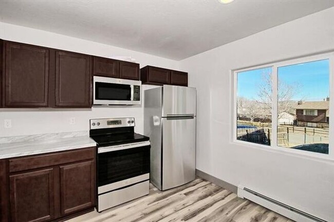 Building Photo - Stunning, Newly Remodeled Condo in Southri...