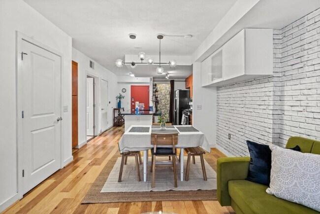 View on the dining room, kitchen, and entrance - 1117 10th St NW