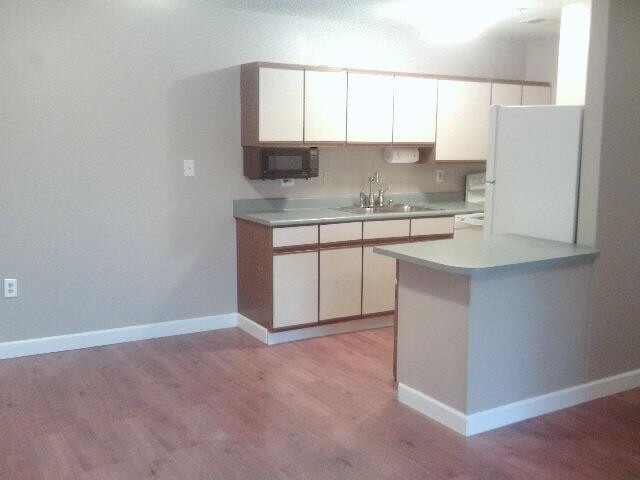 Building Photo - 209 Simpson Ave