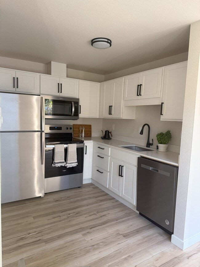Kitchen with new SS appliances - 1413 N Oakes St