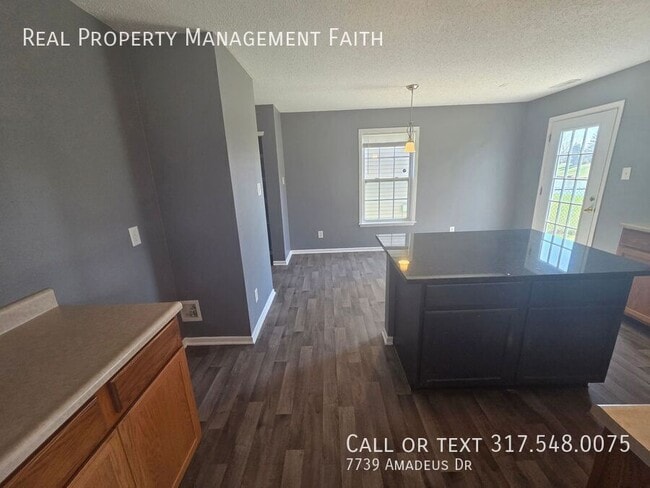 Building Photo - 7739 Amadeus Dr