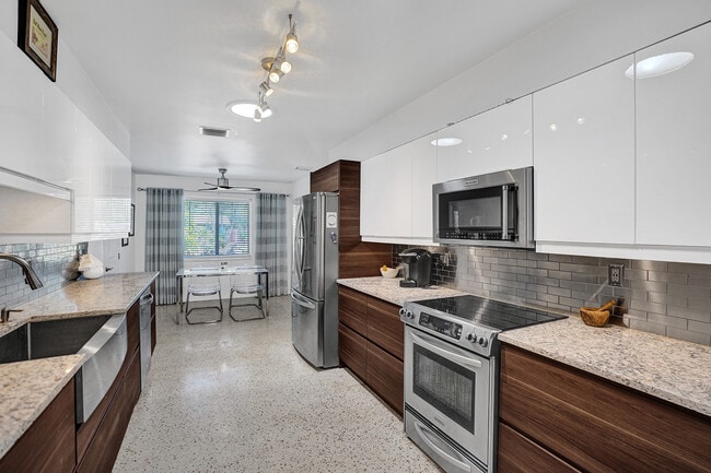 Kitchen with Stainless Steel - 602 NE 37th St
