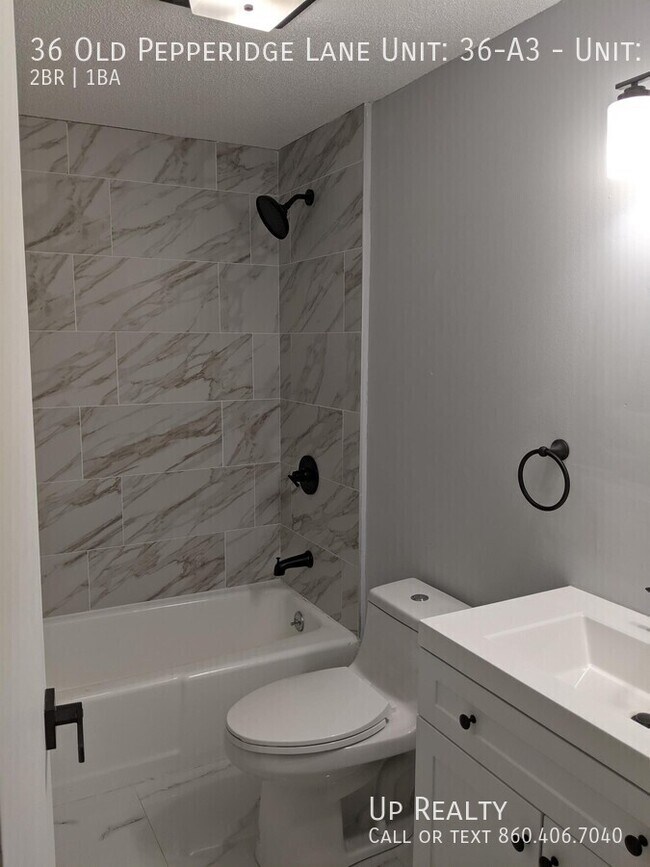 Foto del edificio - 36 Old Pepperidge Ln