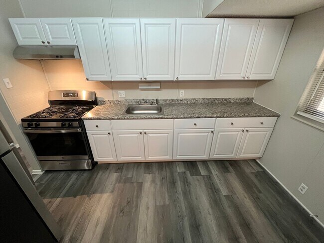 Building Photo - Renovated Three Bedroom Home with Basement...