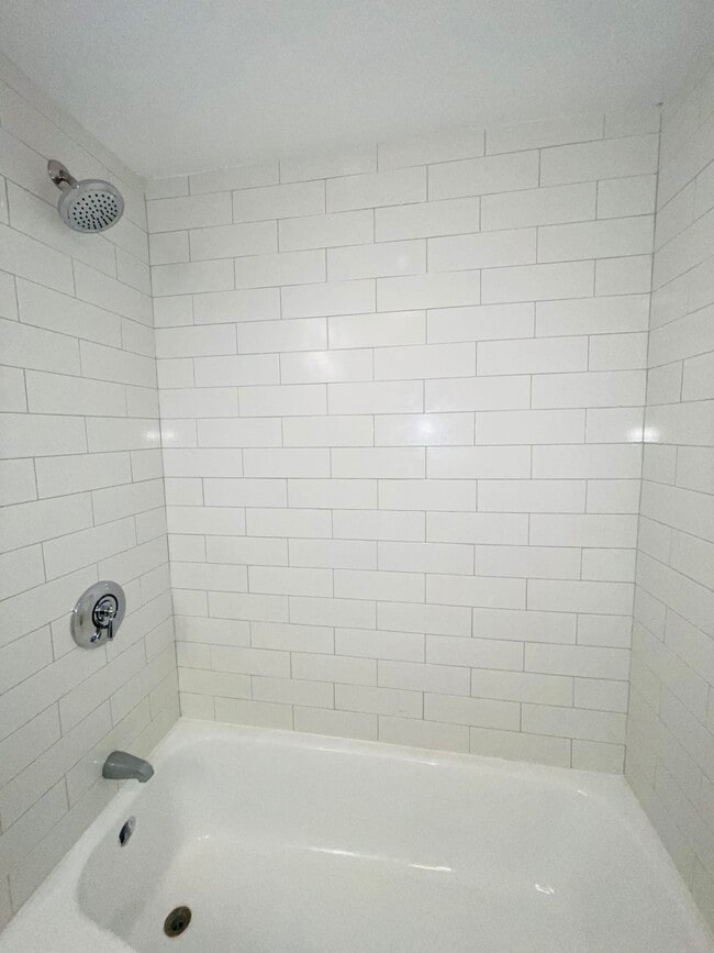New tiled bath - 106 Moore St