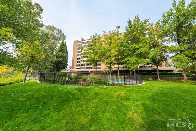 Building A with pool in foreground - 1200 Riverside Dr