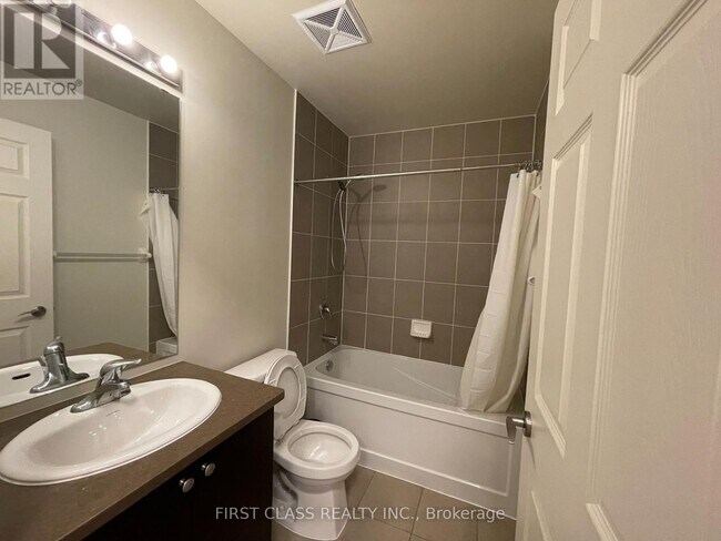 Photo du bâtiment - 339-1339 Rathburn Rd W