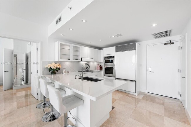 Building Photo - 6799 Collins Ave