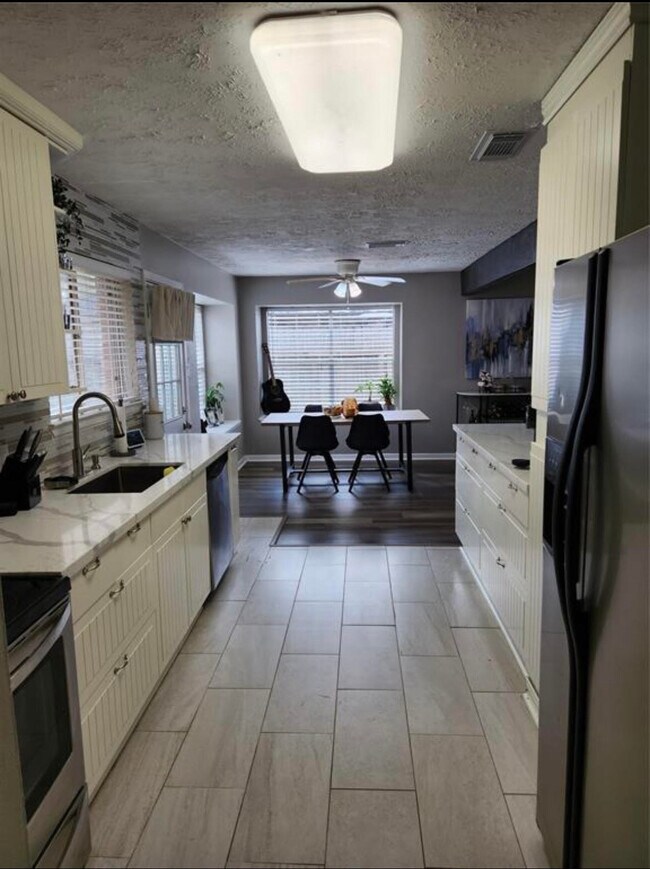 Looking into Kitchen from Hallway - 7310 Kite Hill Dr