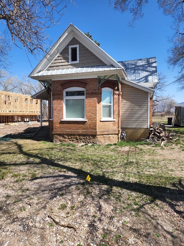 Primary Photo - Newly Renovated 4 bedroom with land!