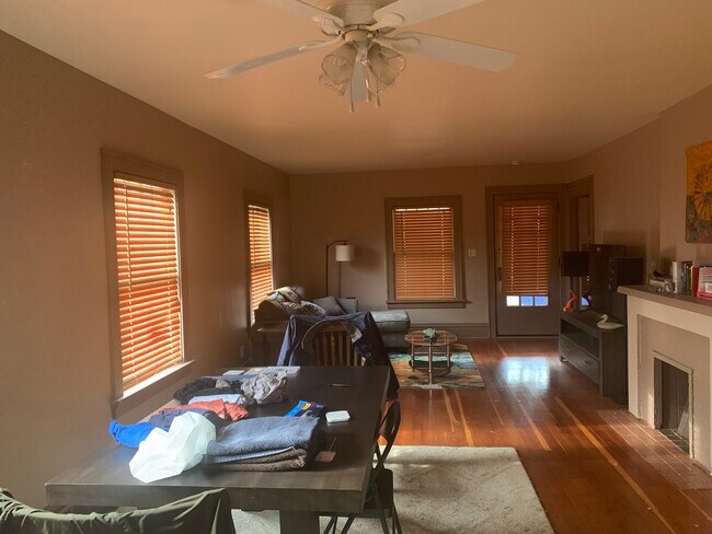 Full living room view, ignore the mess on table! - 4020 Monona Dr