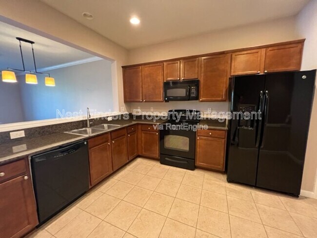 Building Photo - 6937 Woody Vine Dr