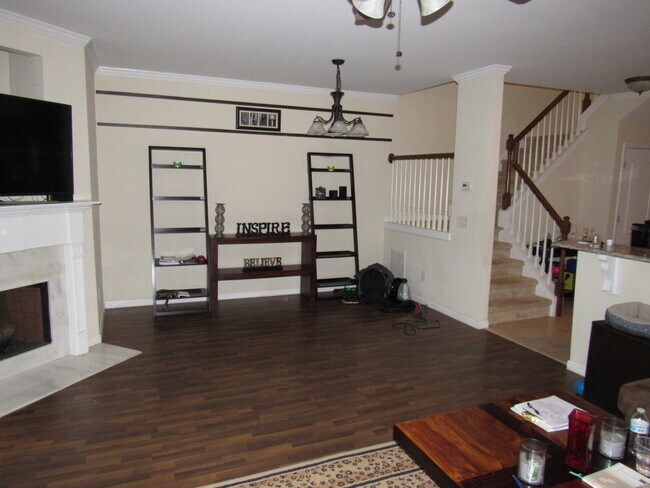 room for a dining table or for extra living room decor - 139 Red Barn Ln