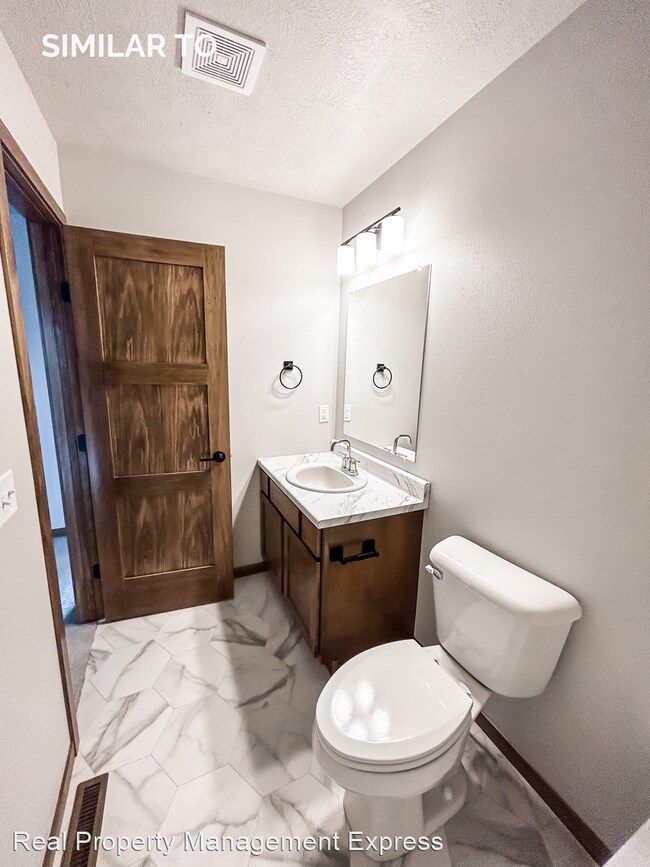 Building Photo - 3 br, 2.5 bath House - 9003 W Jerald Pl