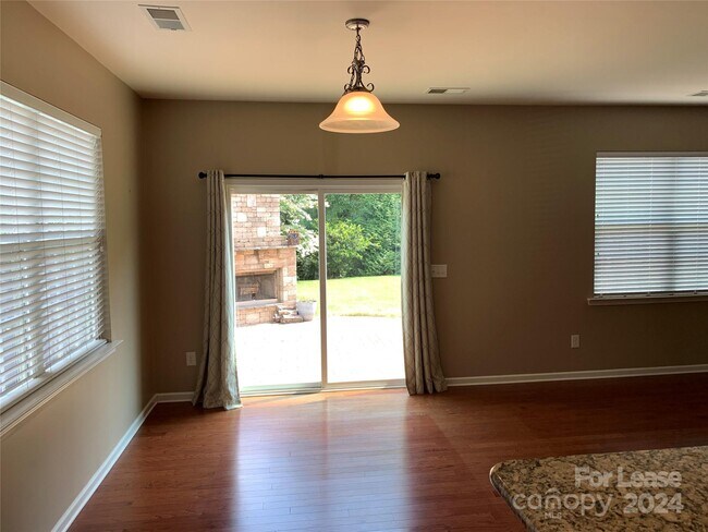 Building Photo - 8899 Happiness Rd