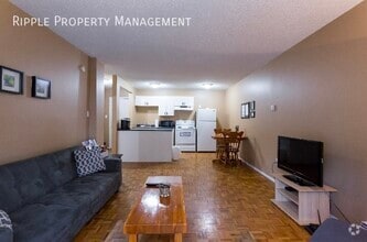 Building Photo - 1337-1313 13 Ave SW