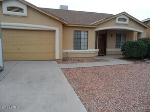 Building Photo - 8553 W Sierra Vista Dr