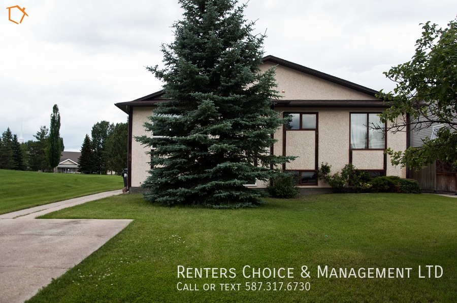 Primary Photo - Roomy Half Duplex Near Schools & Amenities
