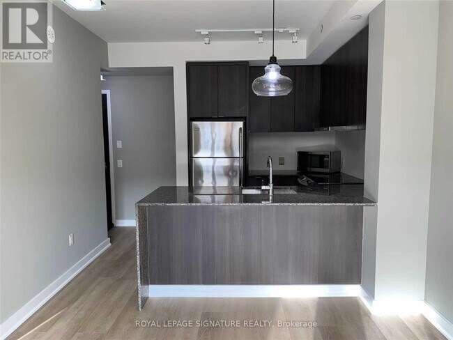 Photo du bâtiment - 5035 Harvard Rd