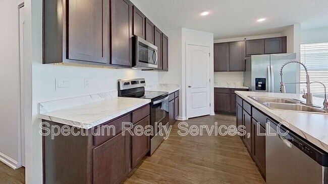 Foto del edificio - 5471 Hollow Birch Dr