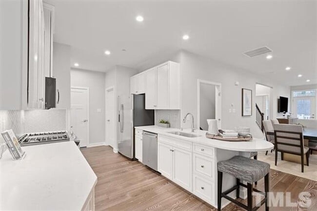 Building Photo - Townhome with Fenced Yard & 2 Car Garage!!