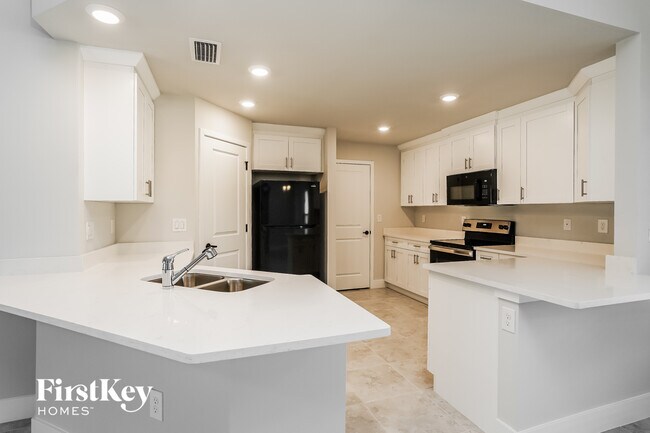 Foto del edificio - 3712 Kitty Hawk Dr