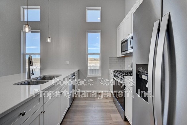 Building Photo - 6872 Lily Mountain Ln