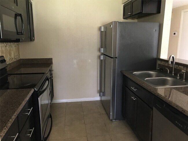 Building Photo - 12029 Greenwood Forest Dr