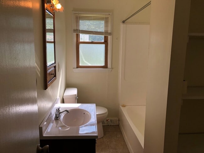 Building Photo - Check Out this Renovated House in a Quiet Neighborhood with a Large Yard!