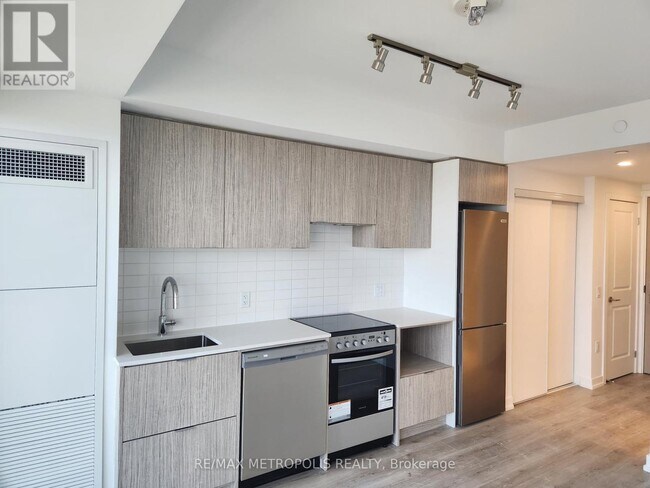Photo du bâtiment - 395-3395 Bloor St E