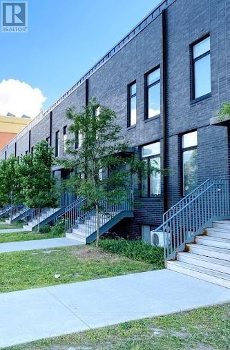 Building Photo - 1720 Simcoe St N